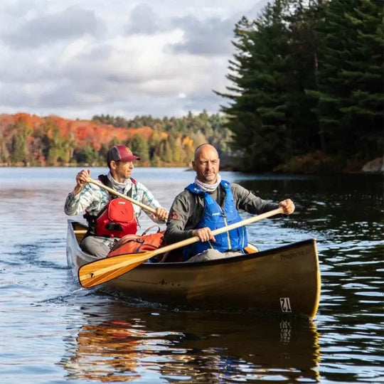 Bending Branches Java ST Paddle Being Used By 2 Men In A Canoe On A River