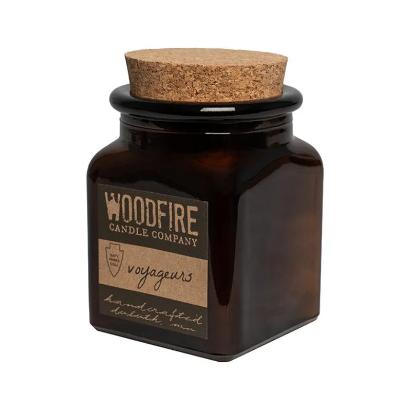 Woodfire Candle Company Voyageurs National Park Soy Candle from side view with a white background