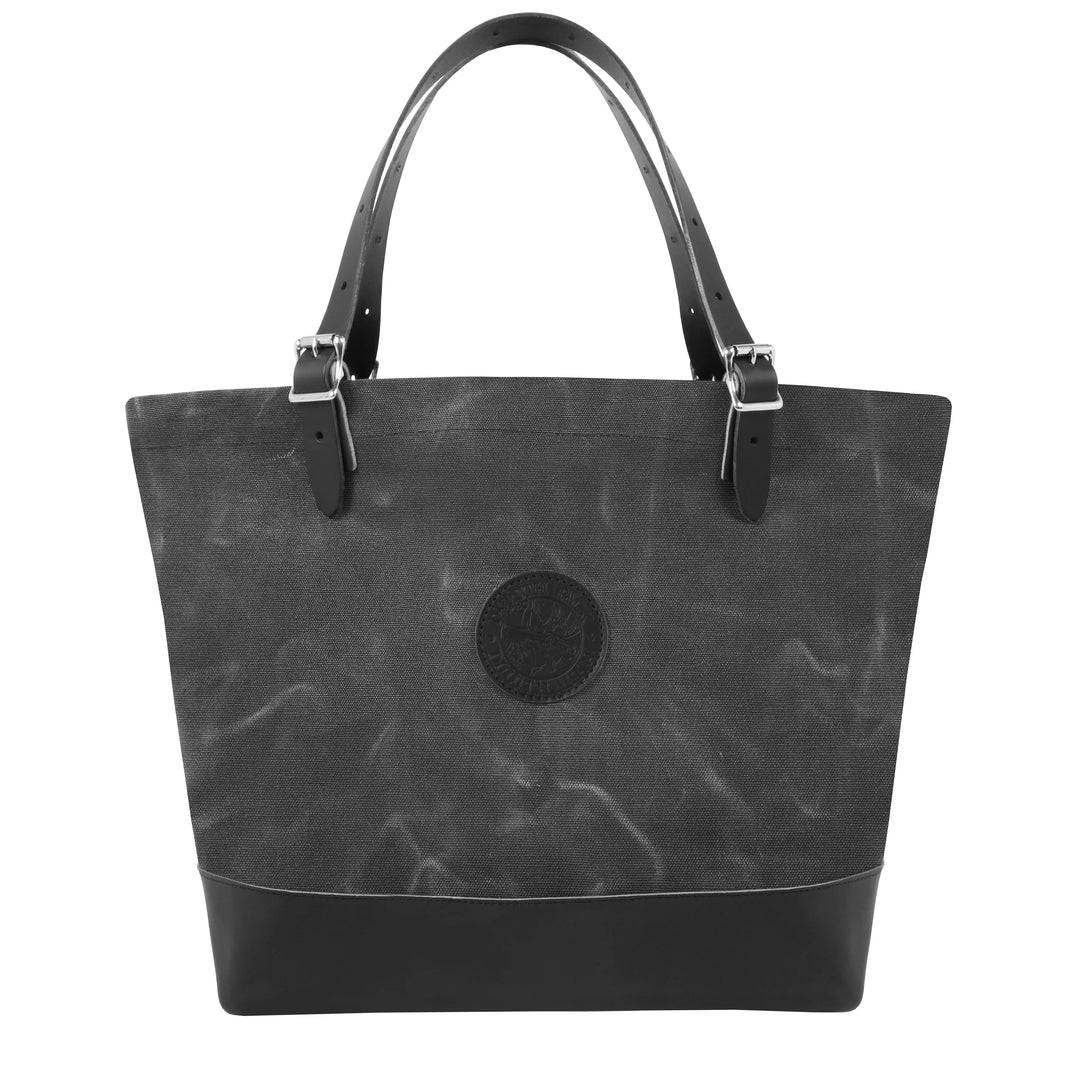 Deluxe Market Tote in waxed grey with leather handles, featuring rugged canvas and durable construction ideal for outdoor use and everyday carry by Duluth Pack.