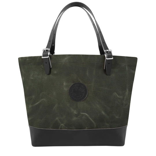 Deluxe Market Tote in waxed olive drab canvas with leather handles and bottom, rugged design perfect for durable outdoor use and everyday carry.