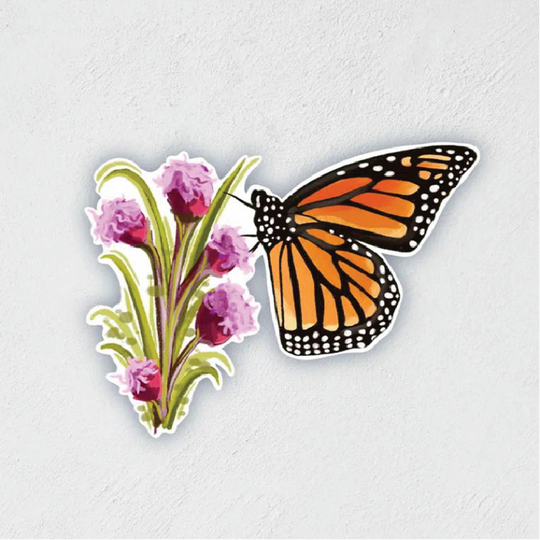 Sticker of a monarch butterfly on some flowers