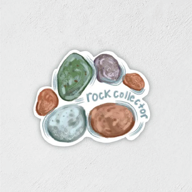 Sticker of some rocks that says "rock collector"