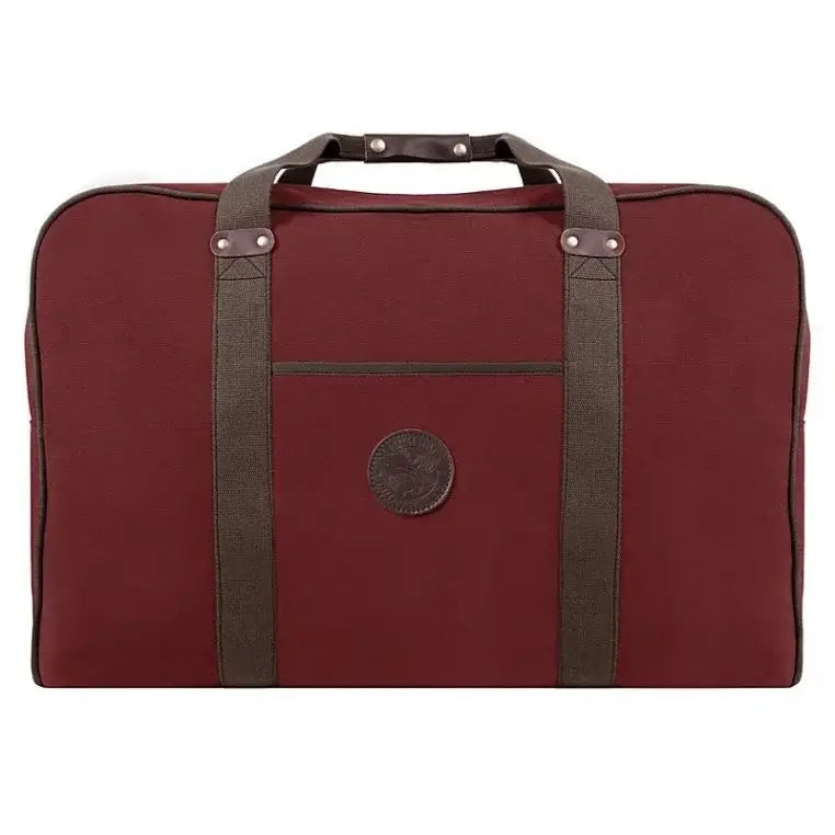 Large Safari Duffel In Burgundy Red On A Plain White Background