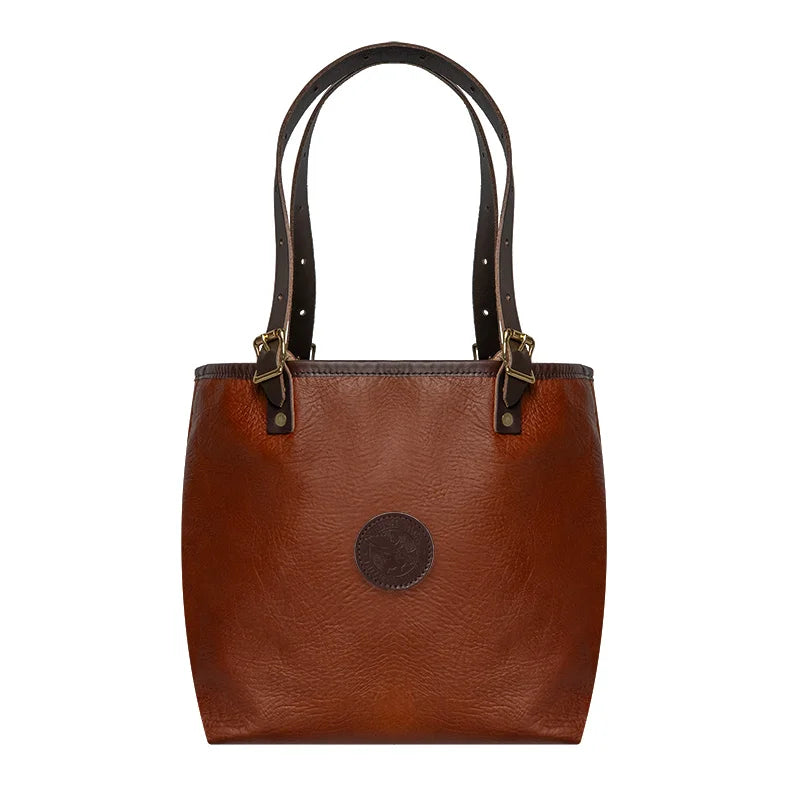 Duluth Pack Bison Leather Travel Tote in brown trim with white background