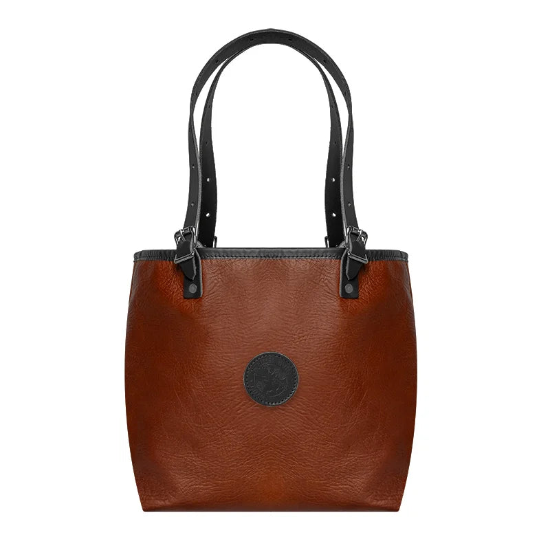 Duluth Pack Bison Leather Travel Tote in black trim with white background