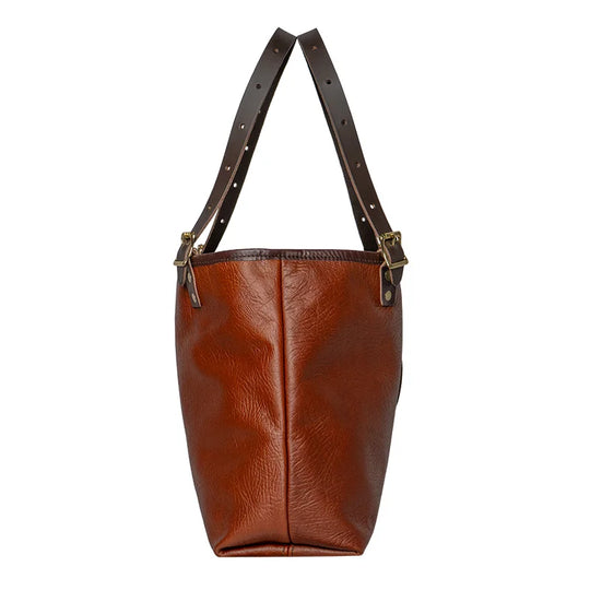 Duluth Pack Bison Leather Travel Tote side view in brown trim with white background