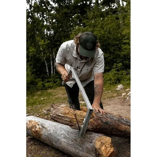 Spring Creek Tuff Camp Saw Being Used To Saw A Large Fallen Tree