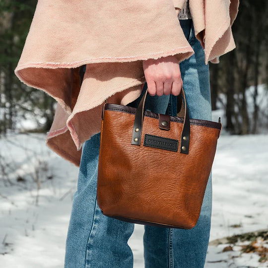 Bison Leather Honeyberry Tote held by model