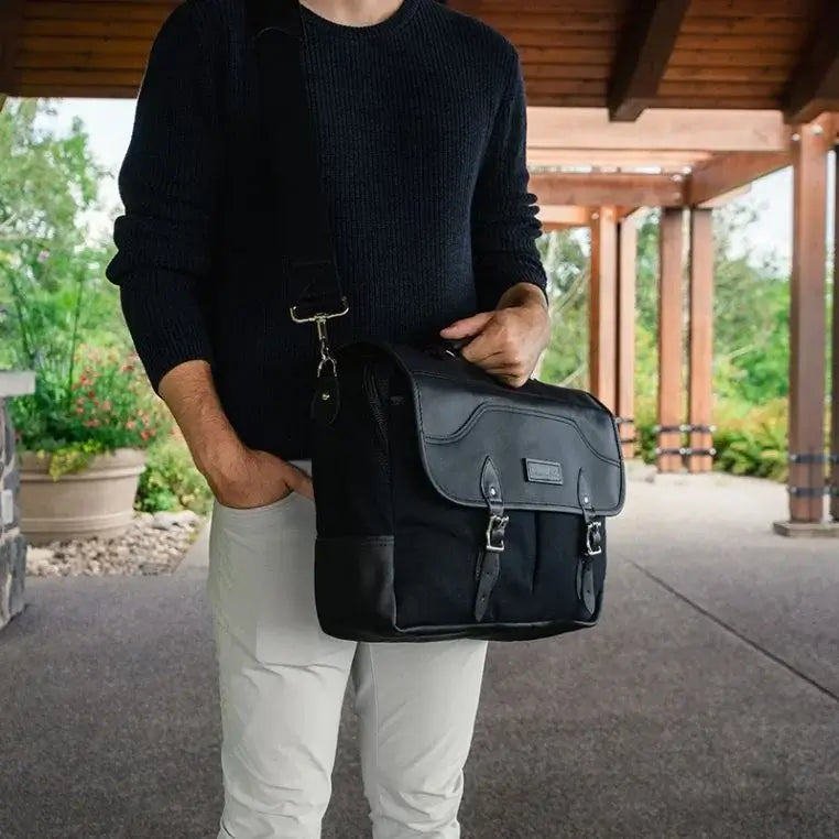 Superior Series Leather Entrepreneur Briefcase Being Carried By A Man In A Gazebo In A Park
